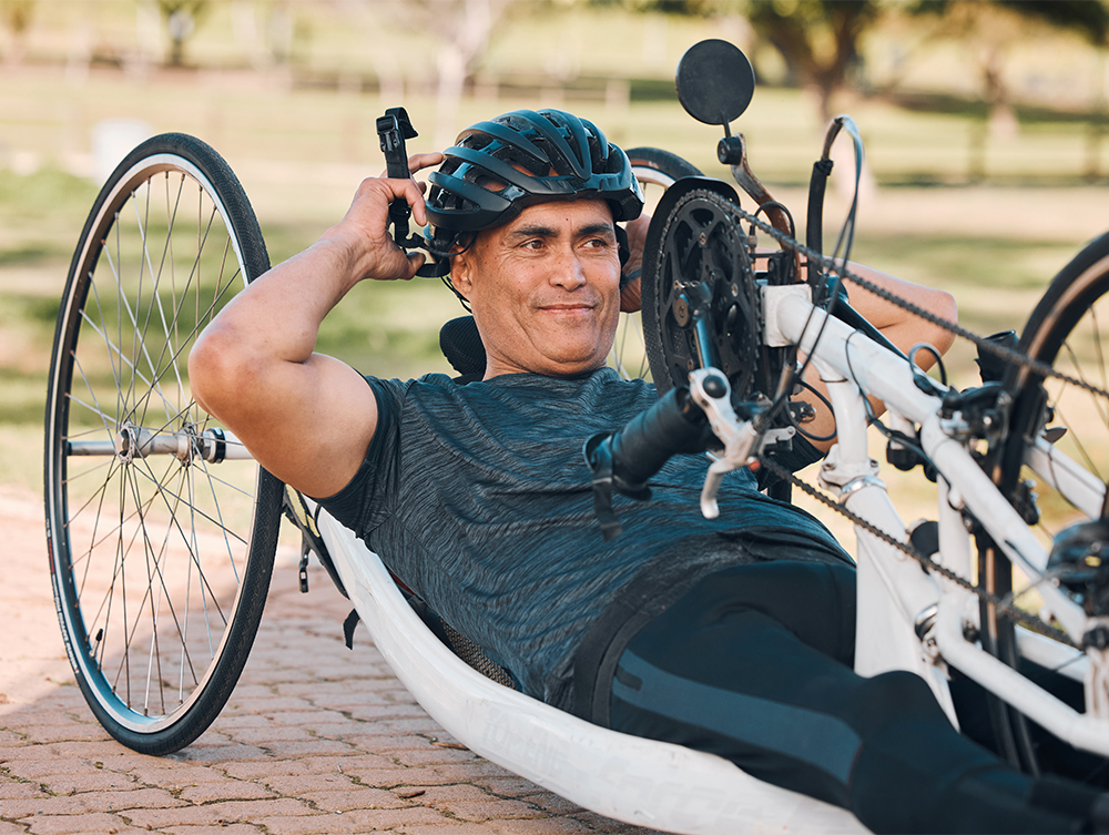 man with a disability and bike for handicap race