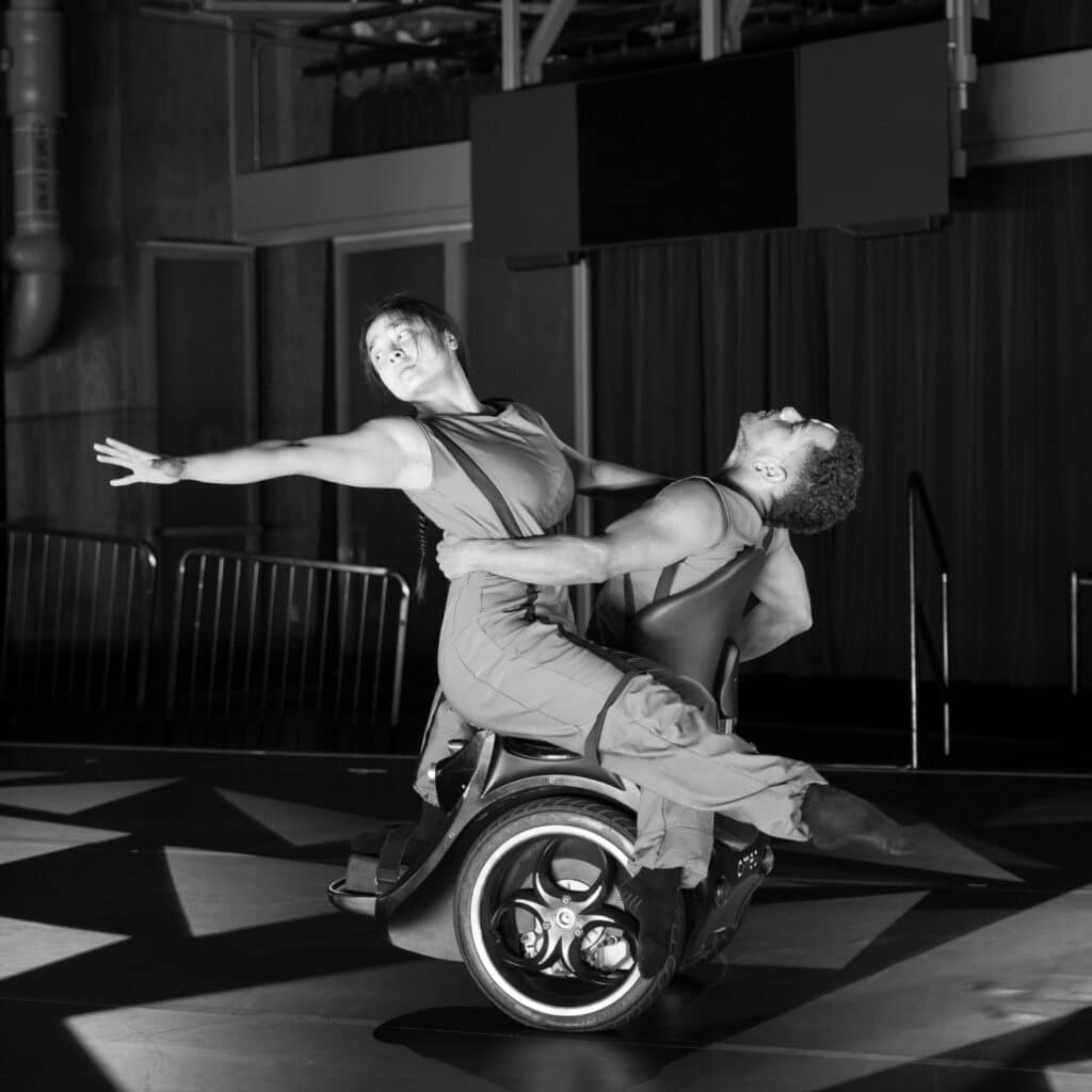 Dancers from AXIS Dance Company perform an integrated contemporary dance featuring a wheelchair user.