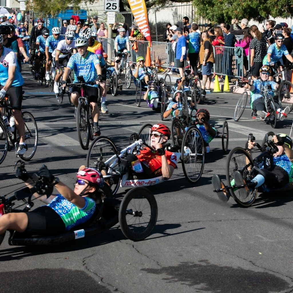 Adaptive cyclists ride handcycles and recumbent bikes alongside traditional cyclists during El Tour de Tucson.
